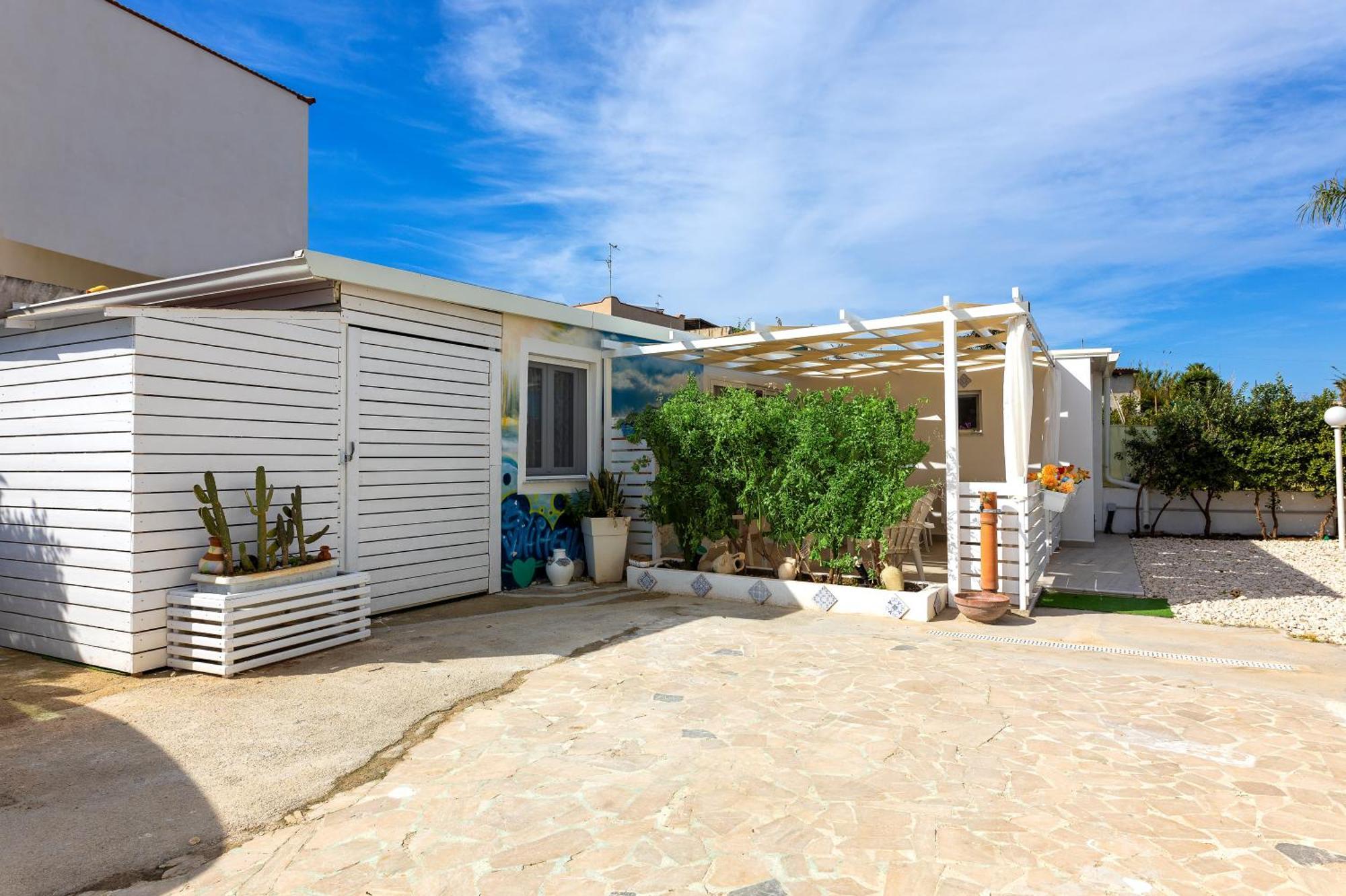 Oasi Siciliana Apartment แตร์ราซีนี ภายนอก รูปภาพ
