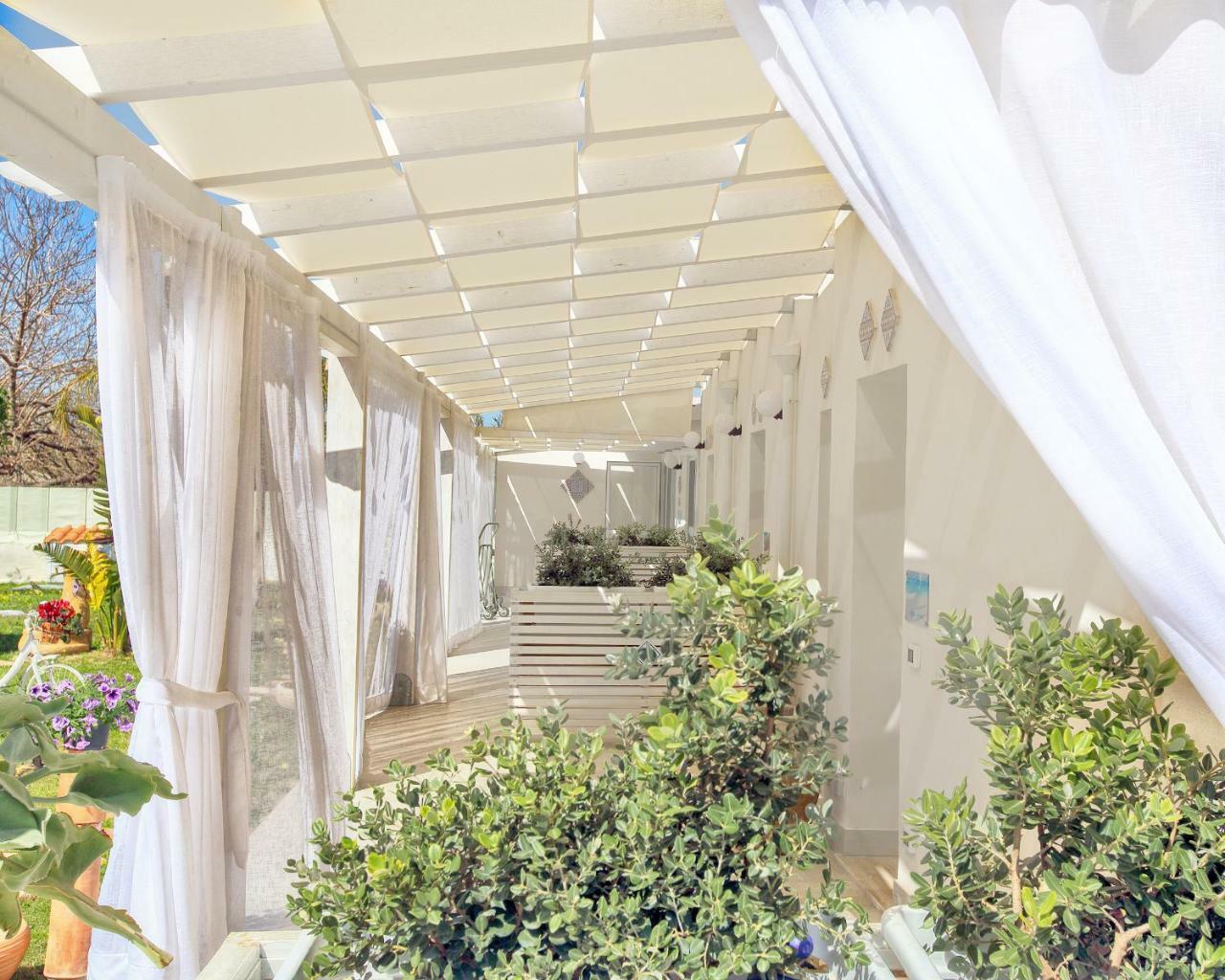 Oasi Siciliana Apartment แตร์ราซีนี ภายนอก รูปภาพ